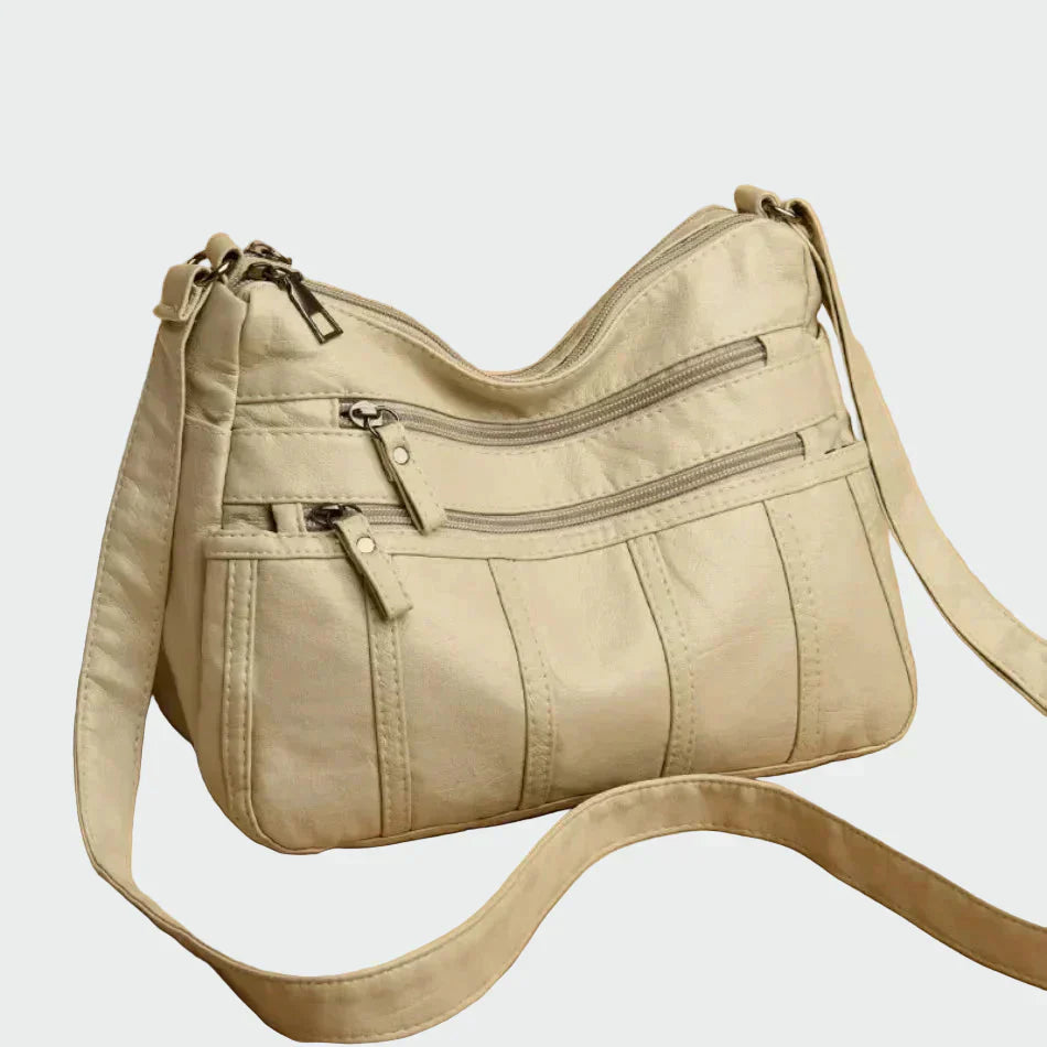 Ilona | Melna mīksta plecu soma ar rāvējslēdzēju