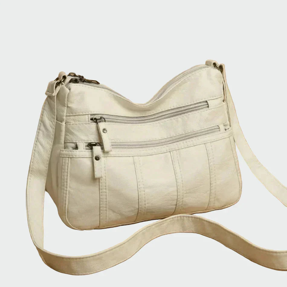 Ilona | Melna mīksta plecu soma ar rāvējslēdzēju